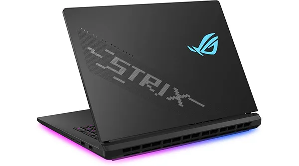 The ASUS ROG Strix SCAR 18, the ultimate performance king among gaming laptops, with its bold RGB lighting glowing in the dark.